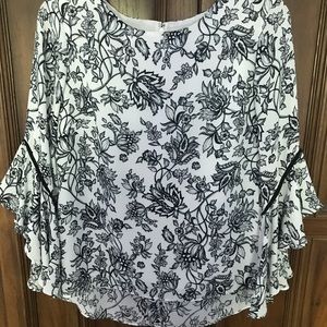 Beautiful flowing black and white blouse